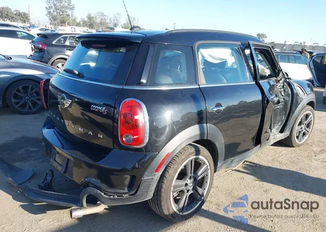 2013 Mini Countryman Cooper S z USA, uszkodzony, nr VIN WMWZC3C57DWP22928